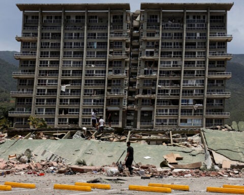 On the streets and in hospitals, Venezuelans scramble to save lives after quake