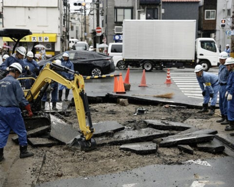 Japan braces for double storms, torrential rains shut down parts of Taiwan