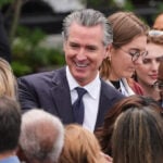 Newsom urges a national 'billionaires' tax' while fighting one in California