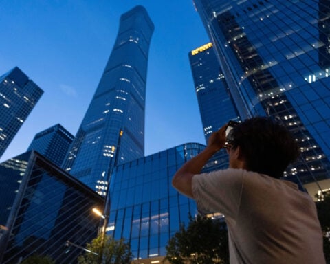 Small aircraft crashes into Beijing’s tallest building, according to flight tracking service