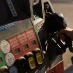 Americans are feeling a little better about the economy as gas prices ease