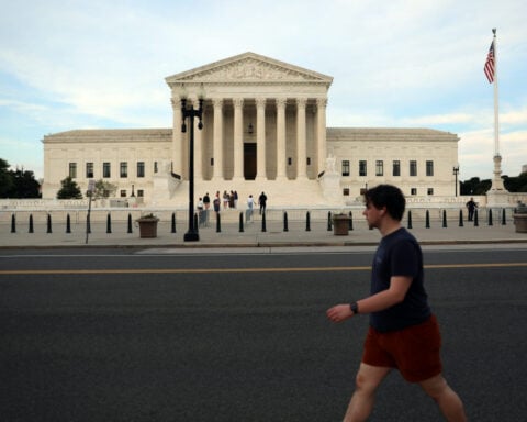 In 2 landmark decisions, the Supreme Court expands gun rights for concealed carry holders and casual drug users