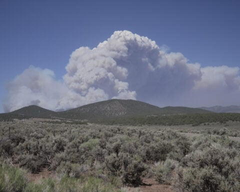 Utah declares a state of emergency and restricts fireworks as US largest wildfire grows