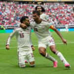 Spain wins World Cup group, beating Uruguay 1-0 as Muslera’s error sends 2-time champion home
