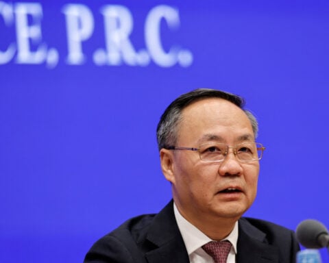 China strips generals, ex-financial regulator, politburo member of lawmaker posts