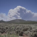 Dangerous weather hampers firefighters and leads to fireworks bans in western US