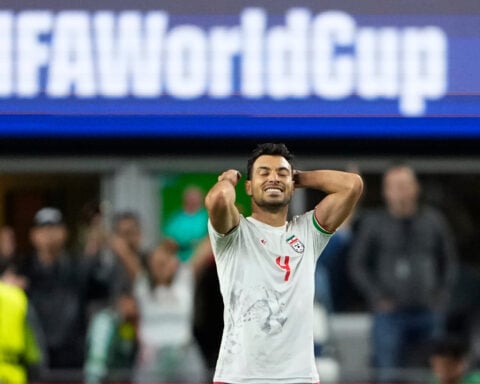 Egypt advances past group stage at the World Cup after a 1-1 draw with Iran