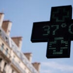 French city-dwellers swap stifling apartments for cool hotel rooms