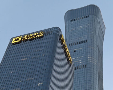 A small plane slammed into the tallest skyscraper in China’s capital. Hours later, it was like nothing had happened.