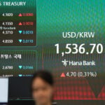 Asian shares are mixed as tech stocks fall in Japan and South Korea