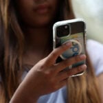 Australia to give regulator more power to pursue Big Tech over under-16 ban