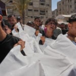 Israeli strike targeting a militant kills 3, including a child, in Gaza