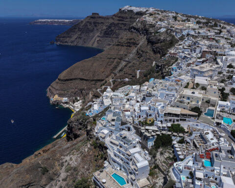 On Greek island of Santorini, winemakers try to adapt to heat and drought