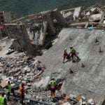 A strong aftershock rattles Venezuela as rescue workers race to find survivors
