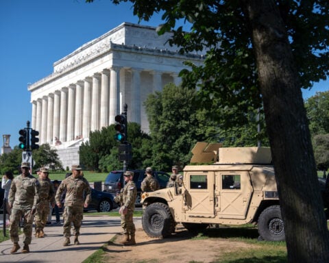 DC will pay $50,000 to man detained while protesting guard patrol with 'Star Wars' song, record says