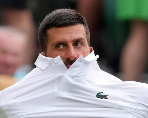 A marriage proposal and Bad Bunny steal attention from Novak Djokovic's opening Wimbledon match