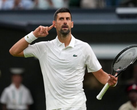 Defending champion Sinner comes back to beat Kecmanovic in 5 sets in 1st round of Wimbledon