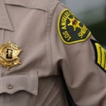Soccer-Police, firefighters proudly wear World Cup badges as they provide security