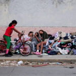 Families of Venezuelans deported from the US and lost in hotel collapse search for loved ones, and for answers