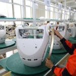 China's factory activity expands in June on high-tech exports