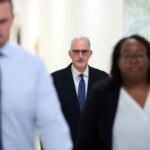 Longtime Clinton aide walks back claim former president visited Epstein island, sources say