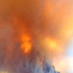 As wildfires worsen, Trump administration revives discredited policy to stomp out all fires quickly