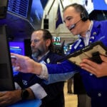 Trading Day: Stocks cap weak month, stellar quarter