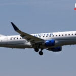 FAA investigating after a passenger tried to open cabin door on regional jet, forcing an emergency landing