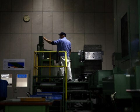 Japan business mood hits 8-year high, builds case for BOJ rate hikes