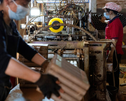 China's factory activity completes strongest quarter since late 2020, private PMI shows