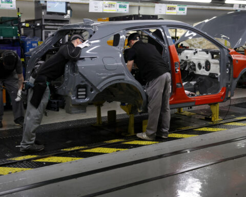 UK manufacturing activity cools despite stockpiling boost to output, PMI shows