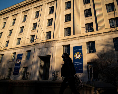 US Justice Department sues Virginia, California over gun laws