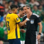 Why are World Cup refs giving red cards to players covering their mouths when confronting opponents?