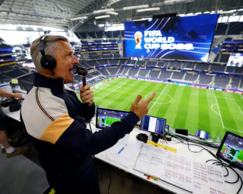 Soccer-'It's crazy': Broadcasters toil, and revel, in supersized World Cup