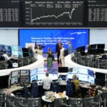Shares pull back as markets await likely payrolls beat