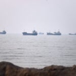 Iran warns oil tankers to use approved routes in Strait of Hormuz or face a 'forceful response'