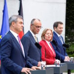 Under-fire German ruling coalition unveils reform package