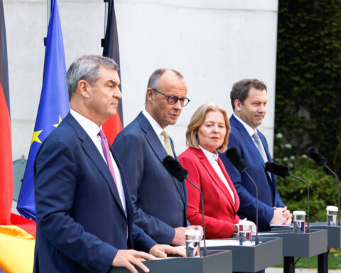 Under-fire German ruling coalition unveils reform package to boost economy