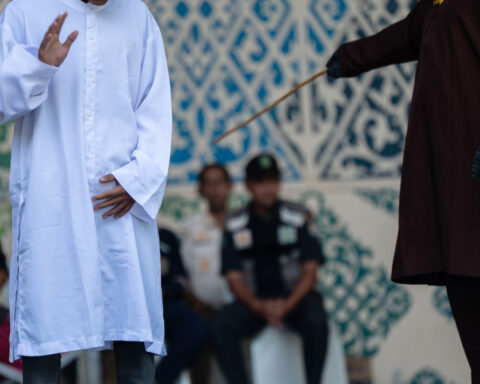 Couple caned for kissing on TikTok in Indonesia's conservative Aceh province