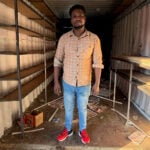 Scared but staying: Some migrants dig in as South Africa turns hostile