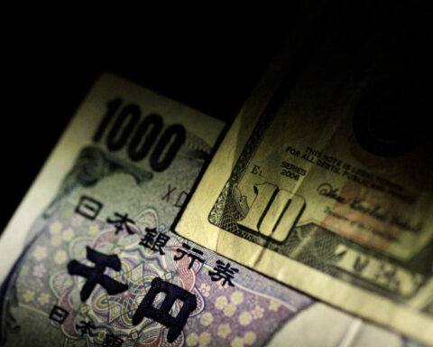 Dollar slides after soft jobs report, yen surges