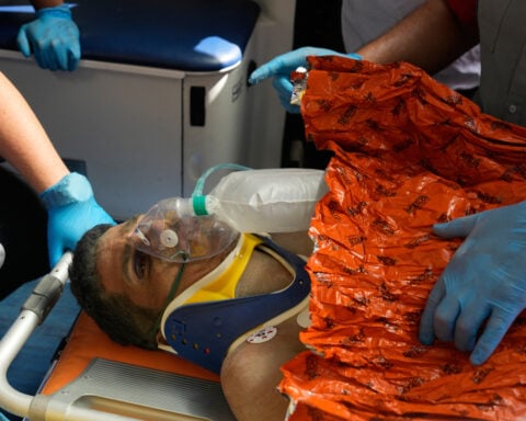 Venezuelan security guard pulled alive from building basement 8 days after twin quakes