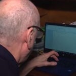 Man who had stroke at 9 writes memoir one keystroke at a time