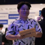 Fans mark the release of new Haruki Murakami novel at a midnight event in Tokyo