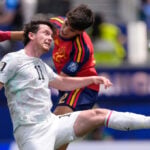 Mikel Oyarzabal's 2 goals send dominant Spain past Austria 3-0 and into round of 16 at the World Cup