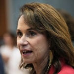 A grand jury indicts Louisiana's attorney general in a fight over changes to the local courts