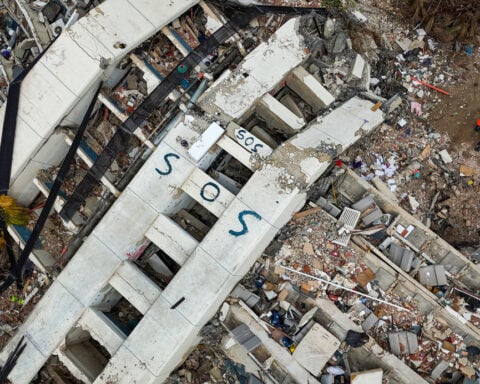 Venezuela's interim leader angrily defends earthquake response