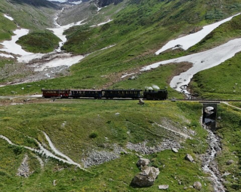 Steam railway that travels through the Swiss Alps celebrates its 100th anniversary