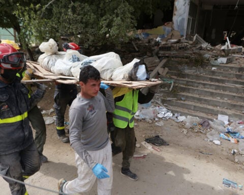 Venezuelans are rushing to identify the bodies of their loved ones as earthquake deaths multiply