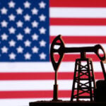 US oil companies see big profit jump, gird for clash over pump prices with Trump